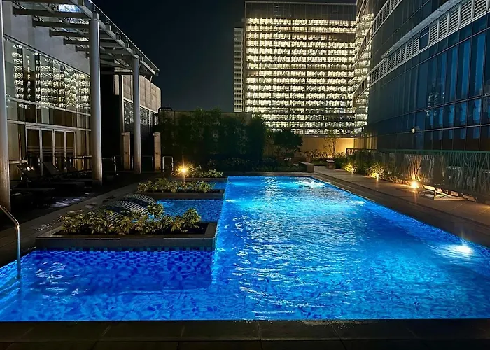 Apartment Brand New Unit In Uptown Bgc With Balcony 55 Inch Smart Tv And 300mbps Wifi, With Workspace, Beside Landers, Near Uptown Mall And Mitsukoshi Mall Manila