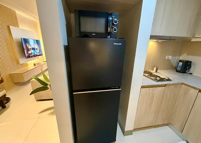 Apartment Brand New Unit In Uptown Bgc With Balcony 55 Inch Smart Tv And 300mbps Wifi, With Workspace, Beside Landers, Near Uptown Mall And Mitsukoshi Mall