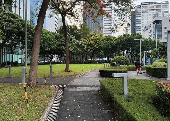 Brand New Unit In Uptown Bgc With Balcony 55 Inch Smart Tv And 300mbps Wifi, With Workspace, Beside Landers, Near Uptown Mall And Mitsukoshi Mall Apartment