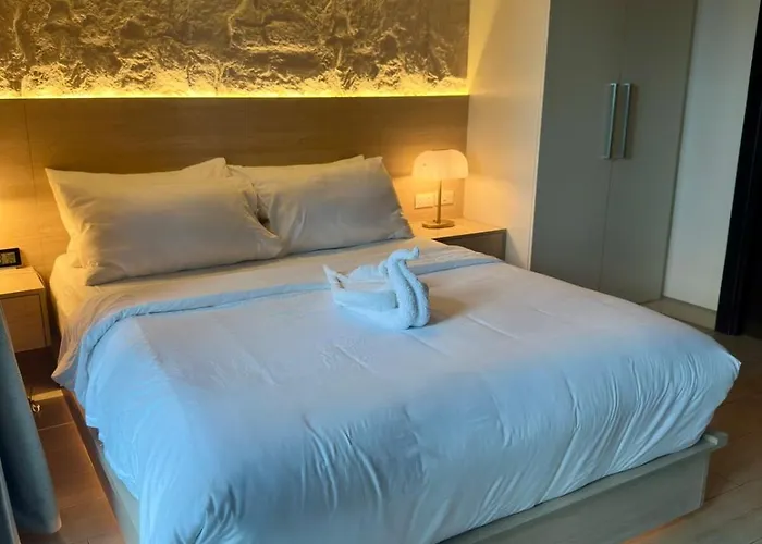 Brand New Unit In Uptown Bgc With Balcony 55 Inch Smart Tv And 300mbps Wifi, With Workspace, Beside Landers, Near Uptown Mall And Mitsukoshi Mall Apartment Manila